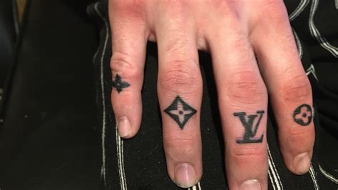 louis vuitton tattoo on hand|louis vuitton finger tattoo.